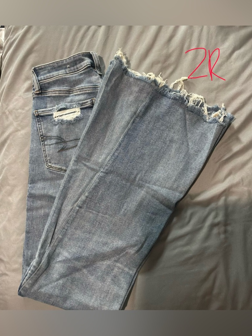 American Eagle Outfitters Light Blue Distressed Hem Women’s Jeans